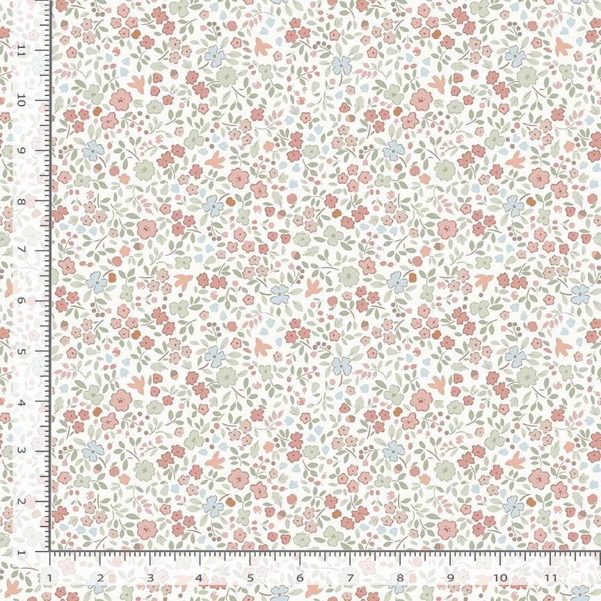 Floral fabric pattern with a ruler for scale on a white background