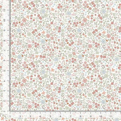 Floral fabric pattern with a ruler for scale on a white background
