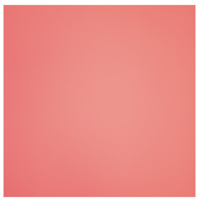 Solid coral pink swatch of faux leather fabric for sewing and crafting