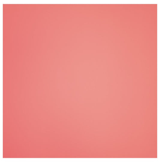 Solid coral pink swatch of faux leather fabric for sewing and crafting