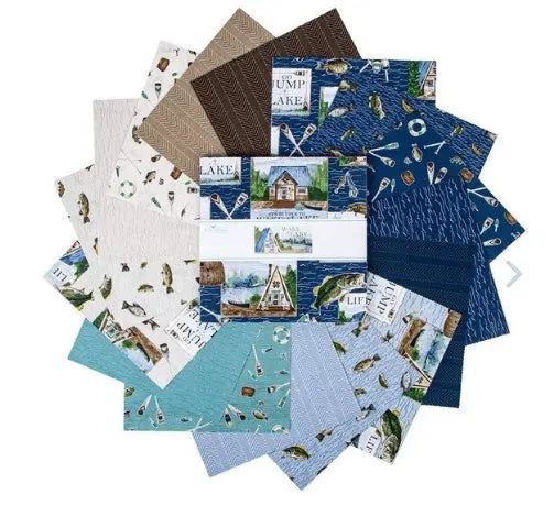 A collection of fabric bundles from Riley Blake's 'Wake by the Lake' line, featuring various patterns including lake scenes and wildlife.
