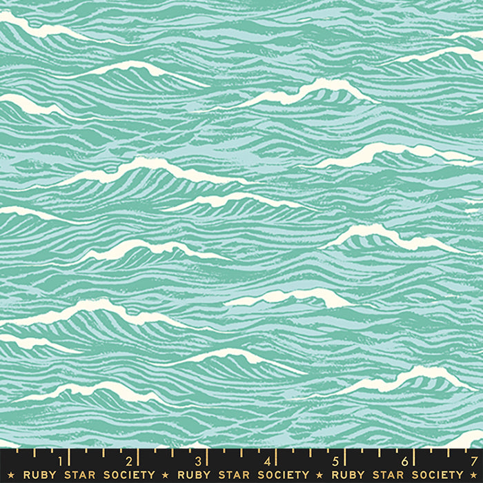 A repeating fabric pattern of stylized ocean waves in mint green, teal, and cream, with a black ruler along the bottom edge displaying the Ruby Star Society brand.