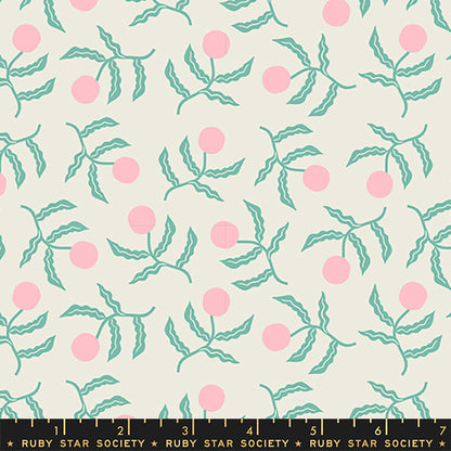 A repeating fabric pattern featuring light pink cherries and mint green leaves on a warm cream background, with a black ruler at the bottom displaying 'RUBY STAR SOCIETY' and inch markings.