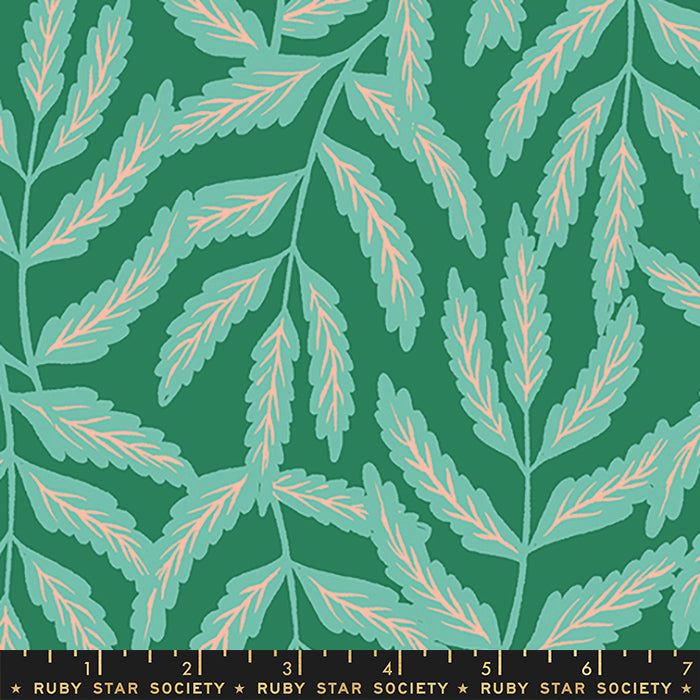 A repeating botanical pattern of stylized leaves in mint green and pale peach on a deep teal-green background, with a black ruler strip along the bottom edge labeled Ruby Star Society.