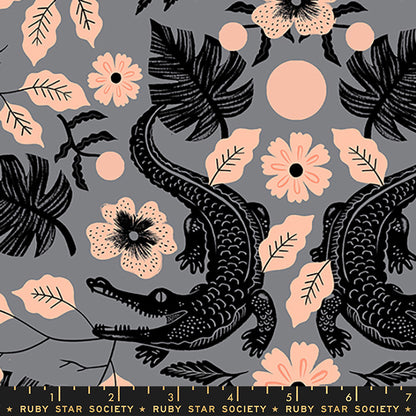 A repeating fabric pattern featuring black alligators, pink hibiscus flowers, and botanical leaves on a medium gray background, with a ruler strip at the bottom reading Ruby Star Society.