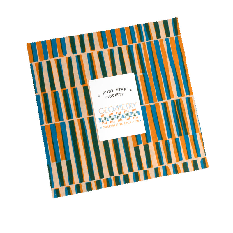 Fabric layer cake with geometric pattern and Ruby Star Society label on a white background