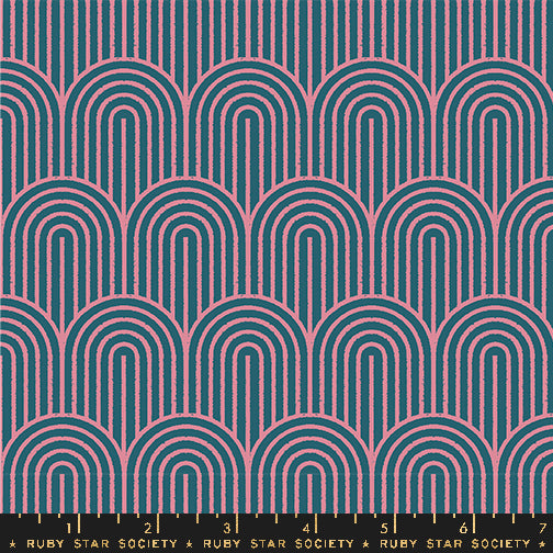 Patterned fabric with arches in pink on a dark blue background, Ruby Star Society label at the bottom.