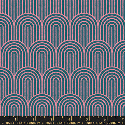 Patterned fabric with arches in pink on a dark blue background, Ruby Star Society label at the bottom.