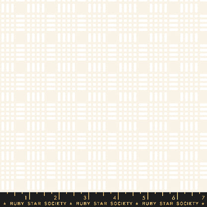 A repeating fabric pattern of white geometric plaid and stripe motifs on a warm cream background, with a black ruler along the bottom edge displaying the Ruby Star Society brand.