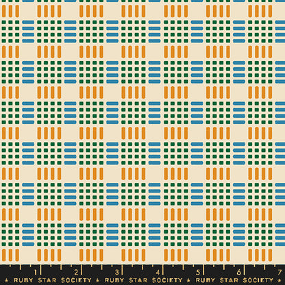 A repeating geometric pattern of blue, green, and orange blocks on a warm cream background, with a black ruler strip at the bottom labeled Ruby Star Society.