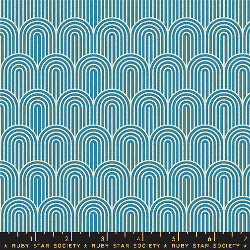 A repeating geometric pattern of teal and cream arches, shown as a fabric or wallpaper swatch with a Ruby Star Society ruler along the bottom edge.
