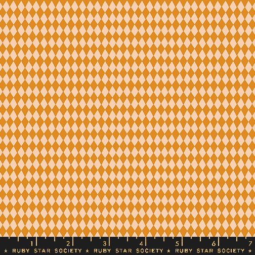 A repeating harlequin diamond pattern in orange and cream, with a black ruler along the bottom edge labeled Ruby Star Society.