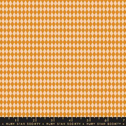 A repeating harlequin diamond pattern in orange and cream, with a black ruler along the bottom edge labeled Ruby Star Society.