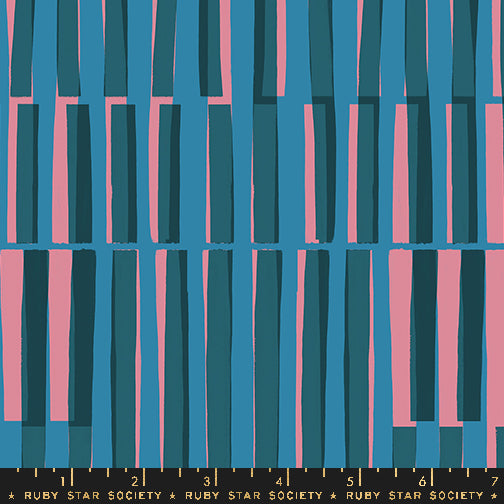 A close-up of a fabric pattern featuring vertical stripes in teal, medium blue, and pink, with a black ruler scale at the bottom labeled Ruby Star Society.