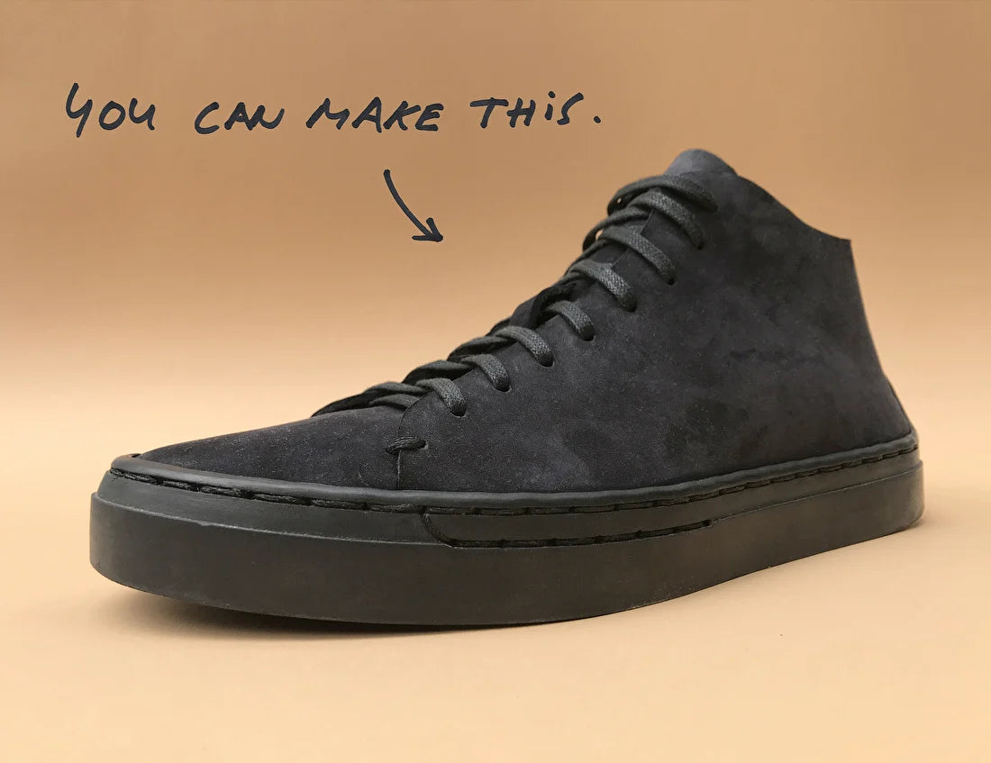 Black suede high-top sneaker on a beige background with text 'You can make this.'