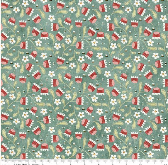 Patterned fabric with red and white floral design on a green background