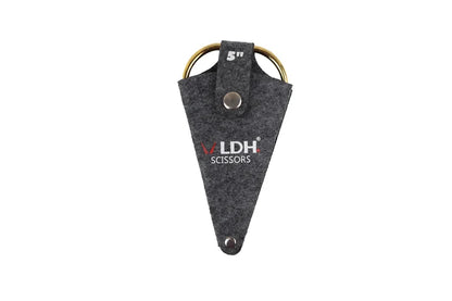 Gray triangular sheath with 'LDH Scissors' branding on a white background hold 5" dragon imperial crafting scissors.