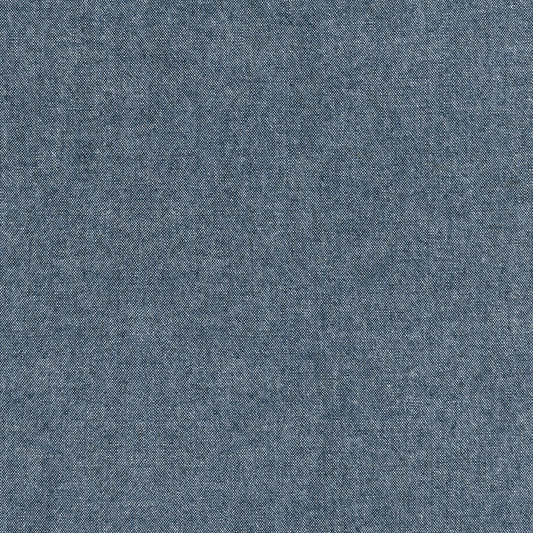 Solid indigo blue denim fabric texture pattern for sewing and crafting. 