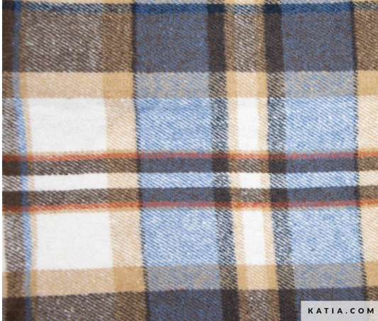 A close-up of a plaid fabric pattern with blue, beige, brown, white, and thin orange stripes, showing a soft woven texture. A small 'KATIA.