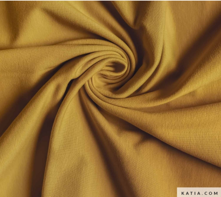 Fabric swatch of mustard yellow knit fabric for sewing apparel and t-shirts