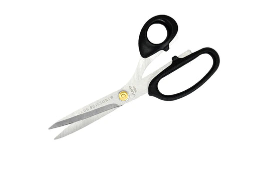 Pair of left handed scissors with black handles on a white background