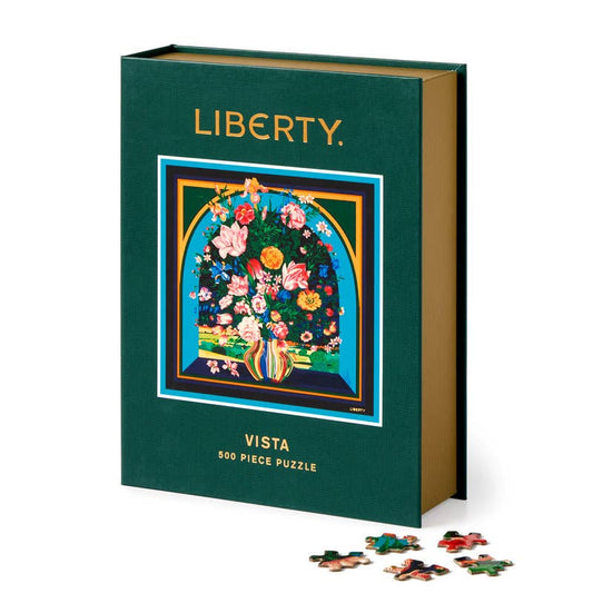 Green puzzle box with floral design and 'Liberty' branding on a white background