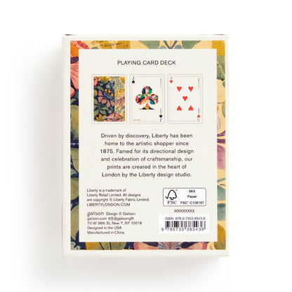 Back of a playing card deck with floral and geometric design, featuring Liberty branding.