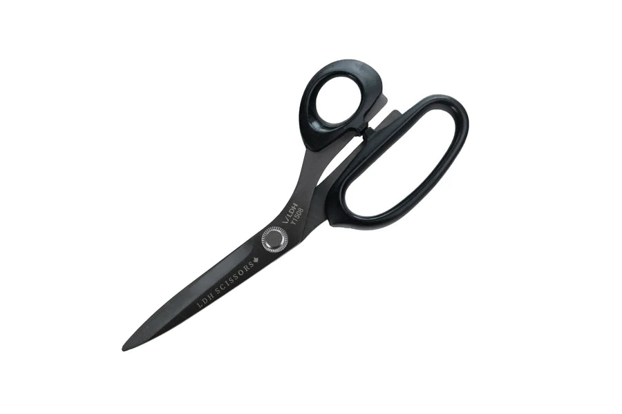Black lightweight scissors on a white background