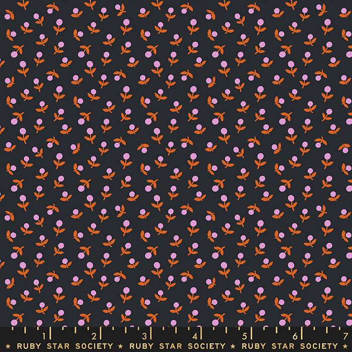 Patterned fabric with pink and orange flowers on a black background, featuring Ruby Star Society label.