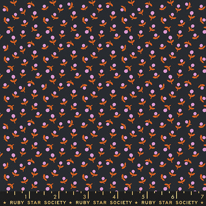 Patterned fabric with pink and orange flowers on a black background, featuring Ruby Star Society label.