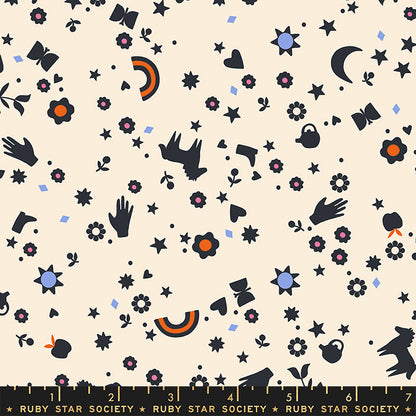 Patterned fabric with black silhouettes on a beige background, featuring stars, flowers, and abstract shapes.