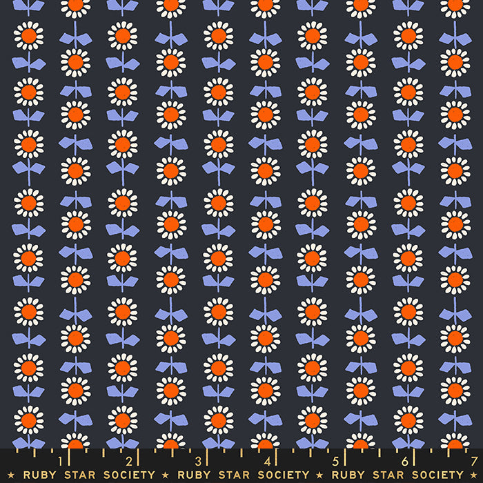 Patterned fabric with flowers and bows on a navy background, featuring the Ruby Star Society label.