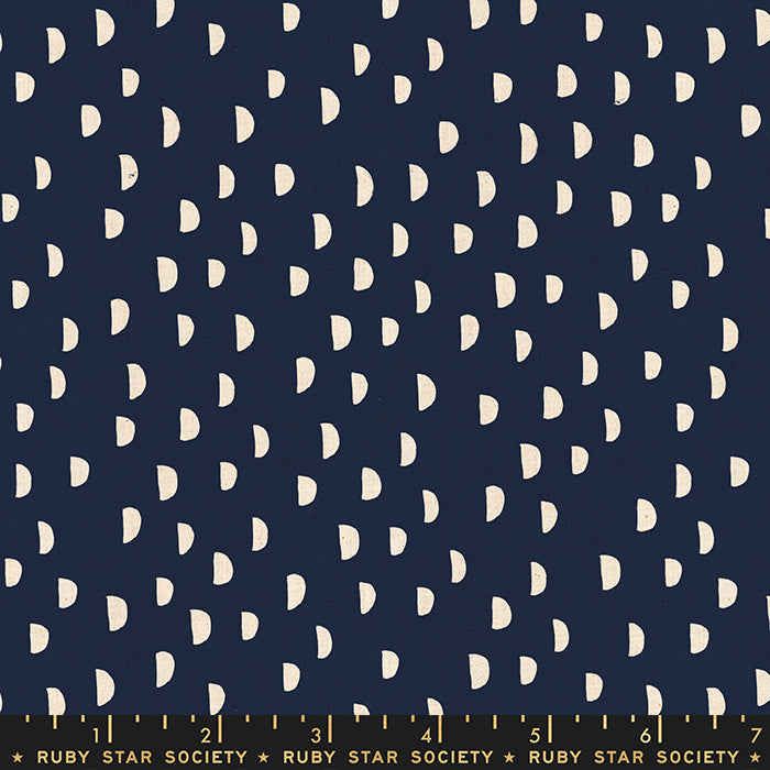 Fabric with a navy background and white half moonpattern. From Heirloom by Alexia Abegg at Ruby Star Society. 100% cotton for sewing, crafting, and quilting. 