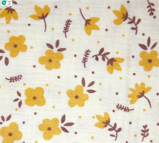 Pattern of yellow flowers and leaves on a white background. cotton fabric for sewing. 