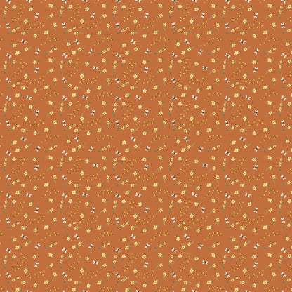 orange colored fabric with small yellow flower illustrations.  typically used for quilting and crafting. from Eden from FIGO Fabrics 