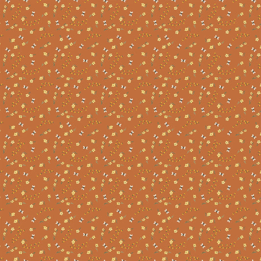 orange colored fabric with small yellow flower illustrations.  typically used for quilting and crafting. from Eden from FIGO Fabrics 