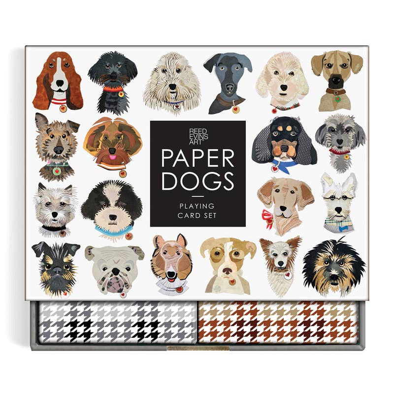 Paper Dogs Playing Card Set, featuring a white box decorated with colorful illustrations of various dog breeds around a central black square with white text. The bottom of the box reveals two rows of houndstooth patterned cards in black/white, gray/white, and brown/white.