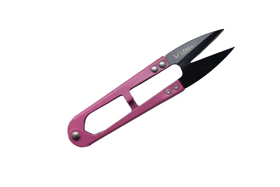 Pink and black thread snips with carbon blades on a white background