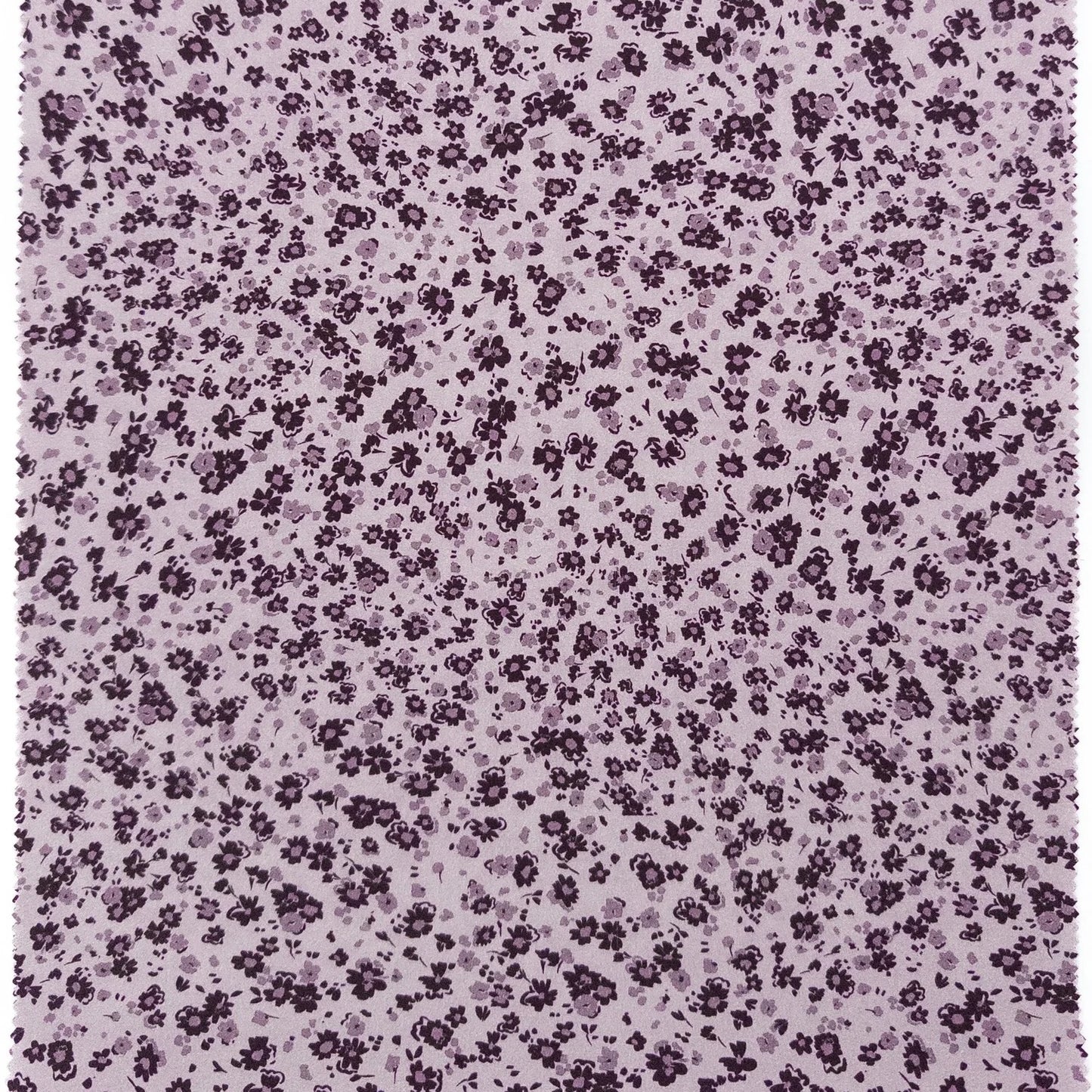 Floral pattern with small purple flowers on a light purple background