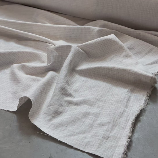 close up of cotton linen blend fabric with subtle checks