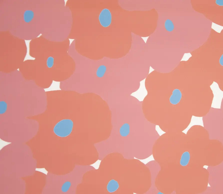 Pattern of red and pink flowers with blue centers on a pink background. raincoat  material fabric for sewing. 