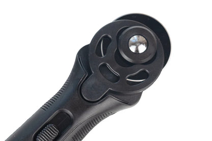 Close up of black rotary cutter for fabric and craft cutting 