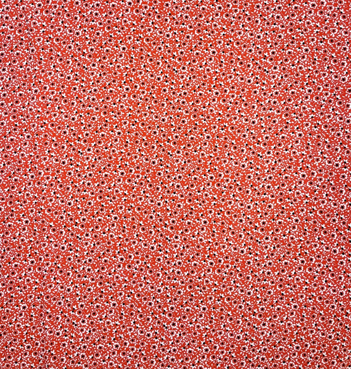 Red floral patterned fabric texture