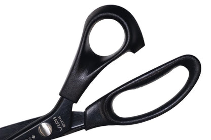 Close up of pinking shears handle.