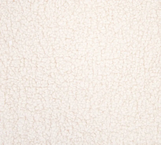 Close-up of a textured beige fabric surface for sewing, jacket lining, sewing. warm fabric for jean jacket
