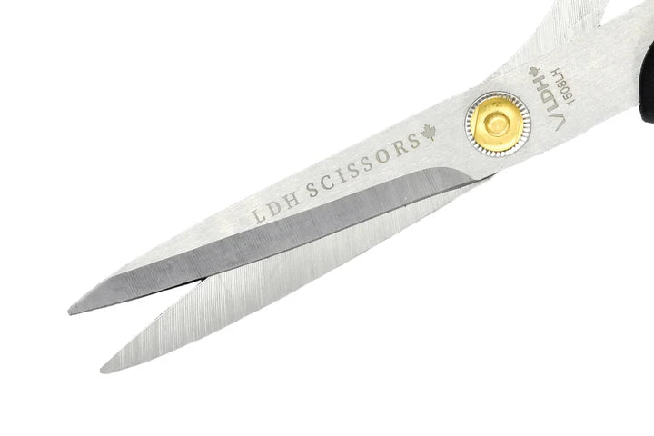 Close-up of a pair of left handed LDH scissors on a white background