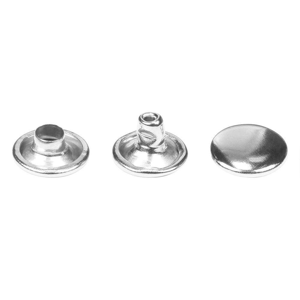 Three silver rivets for sewing garments like pants and jeans