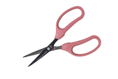 Pink craft scissors on a white background