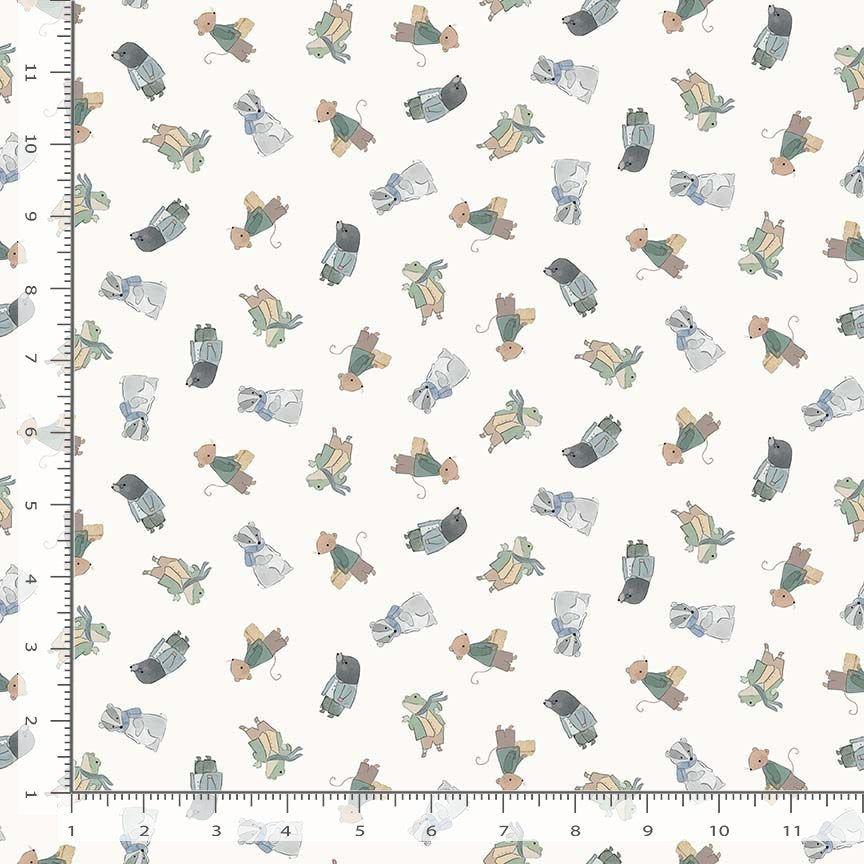 Patterned fabric with cartoon characters on a white background, measured against a ruler.