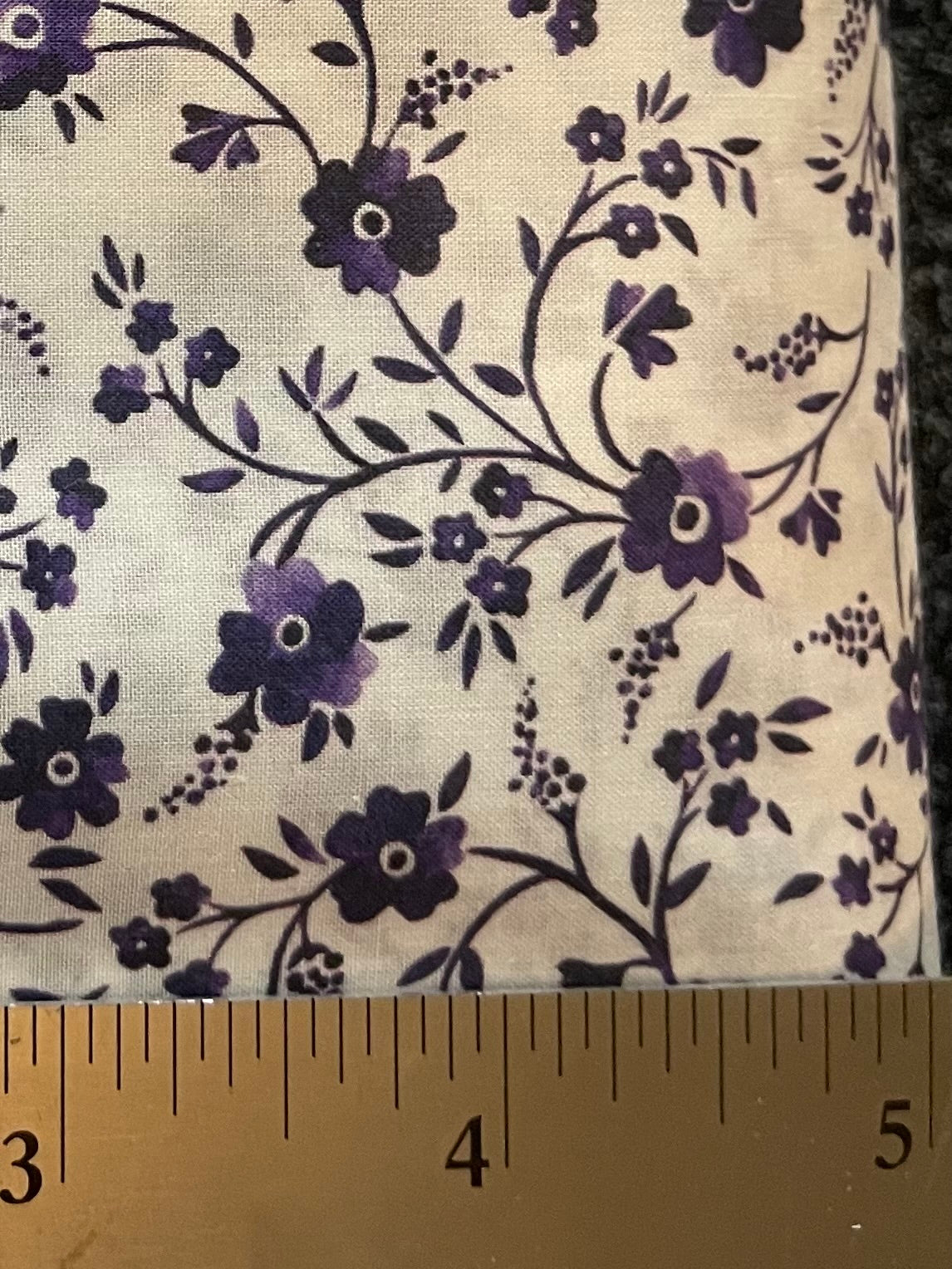close up of liberty of london tana lawn cotton fabric